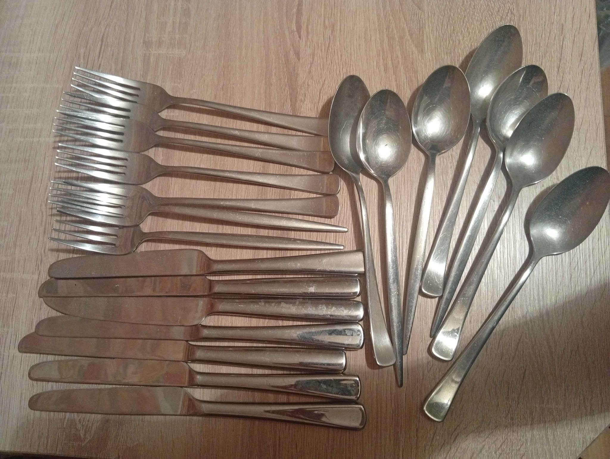 Cutlery set: forks, knives, spoons