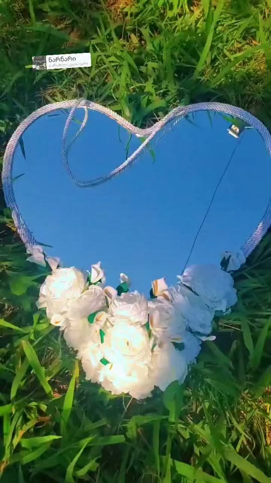 Heart-shaped mirror with flowers
