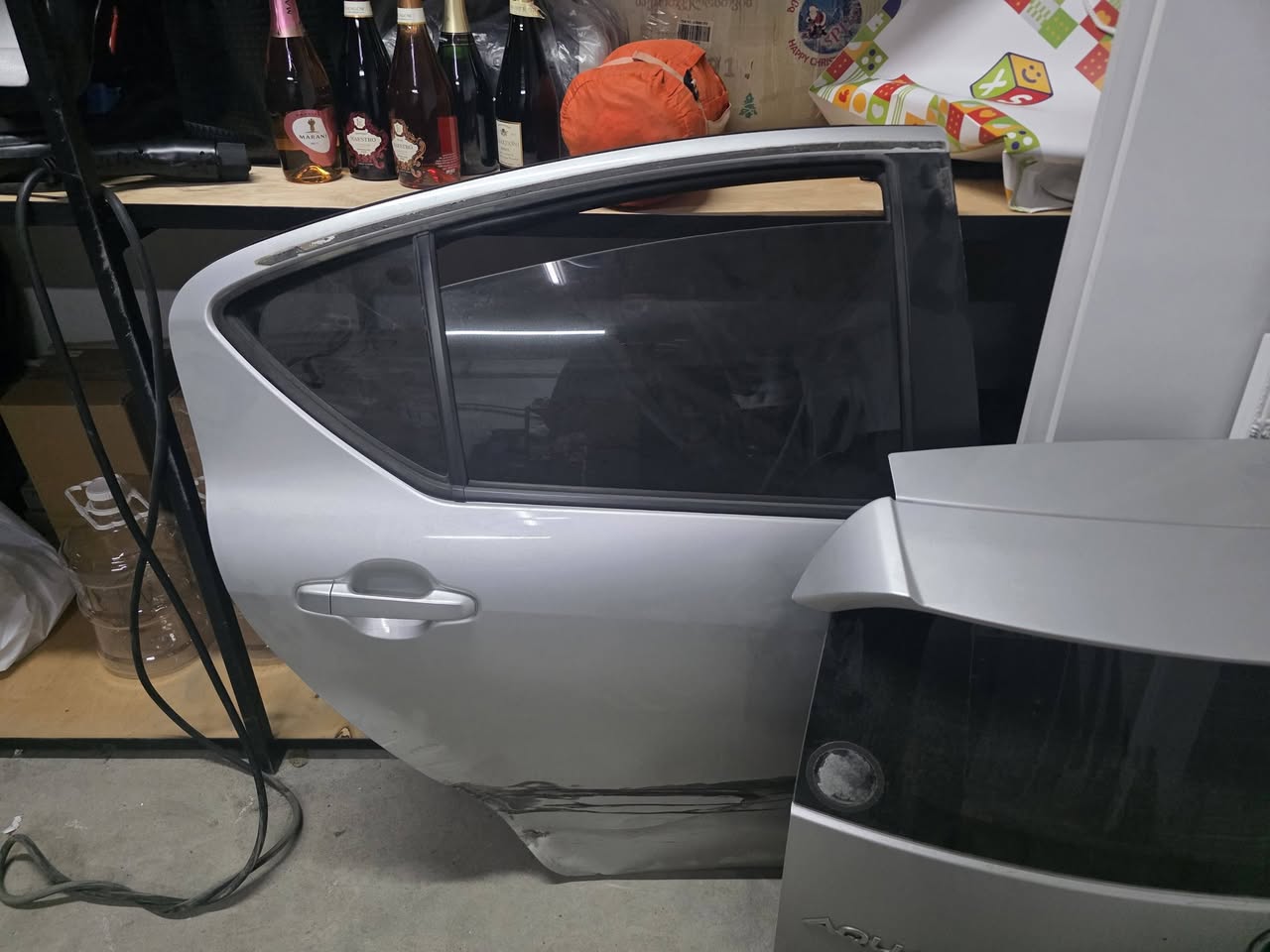 Silver car rear door and trunk lid