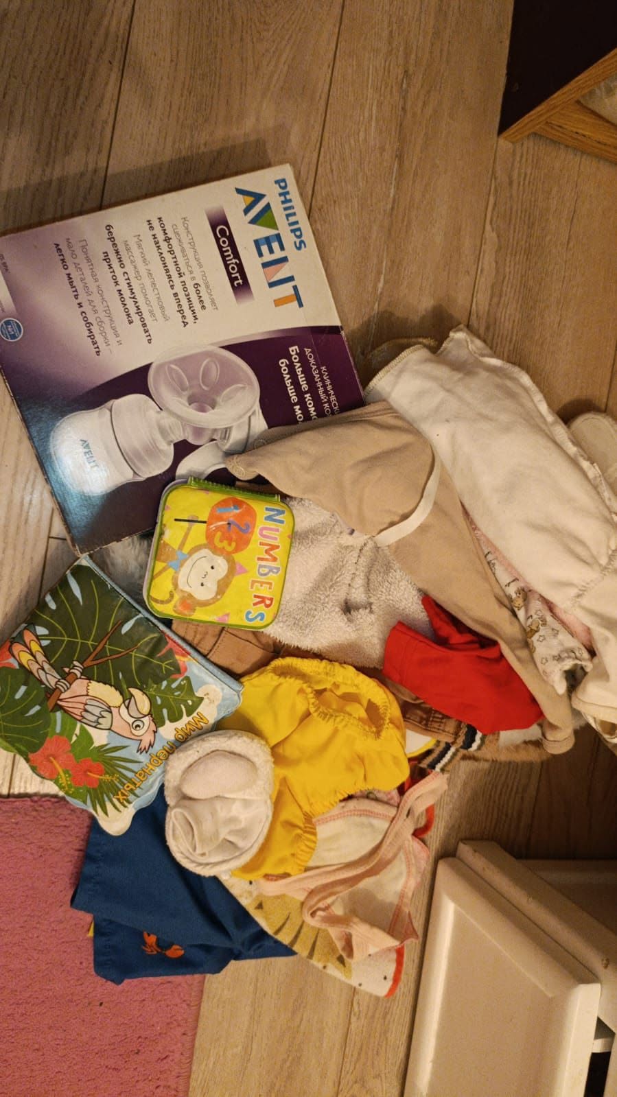 Baby clothes bundle with breast pump