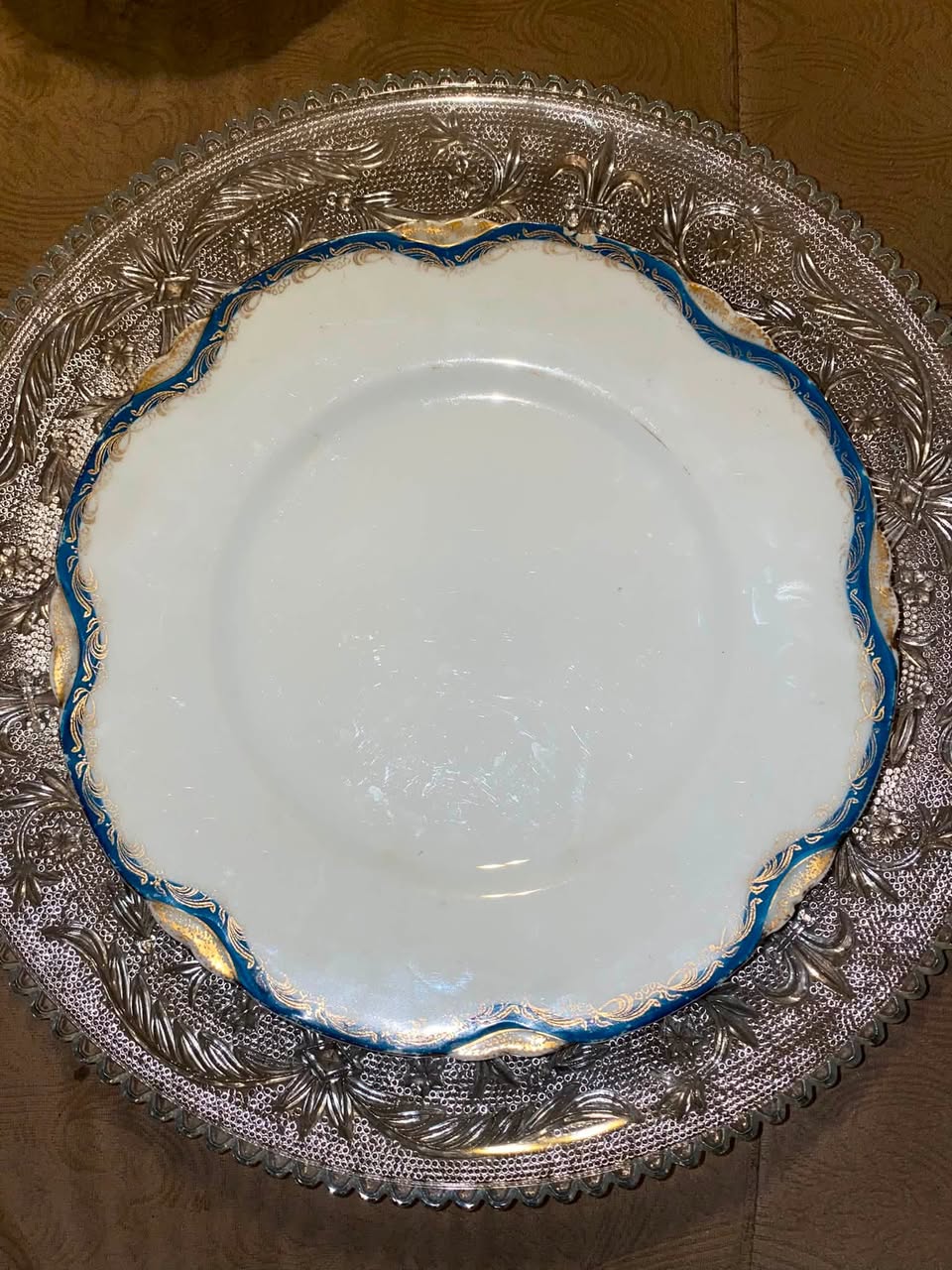 Plates are for sale. The flowery one is 6 cents