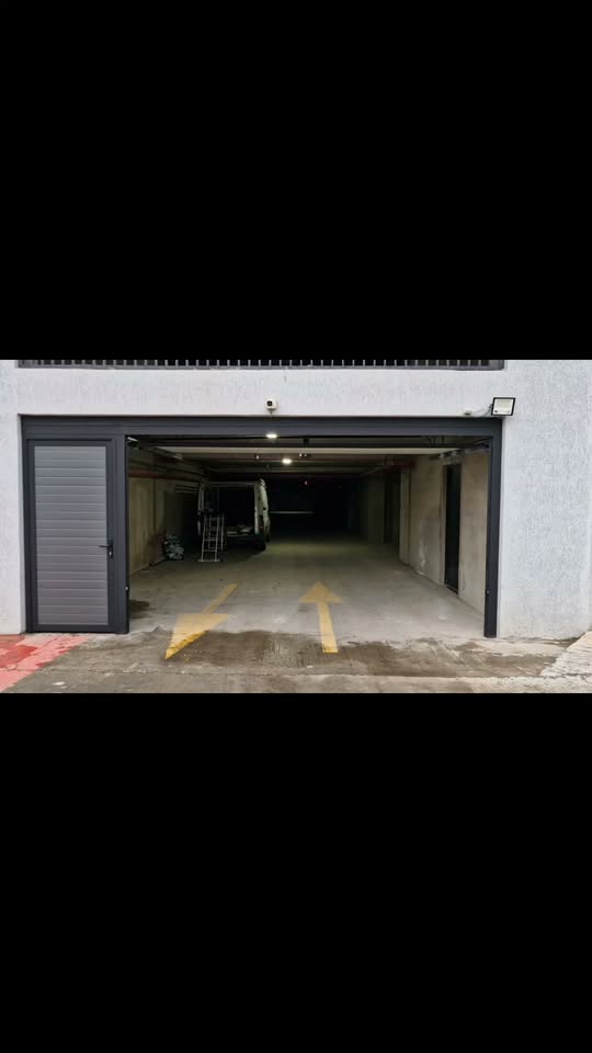 Installation of sectional doors in parking spaces