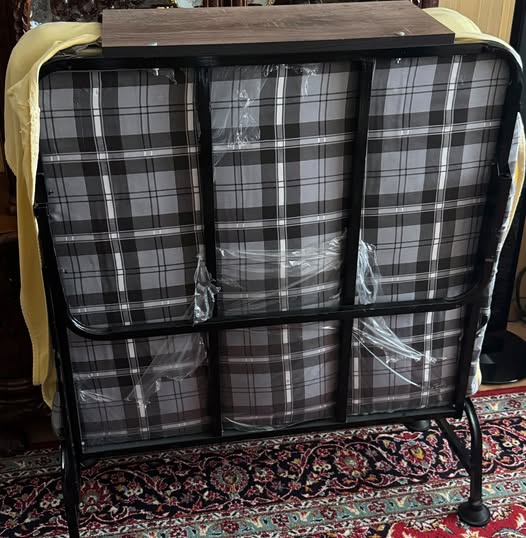 Folding bed with mattresses