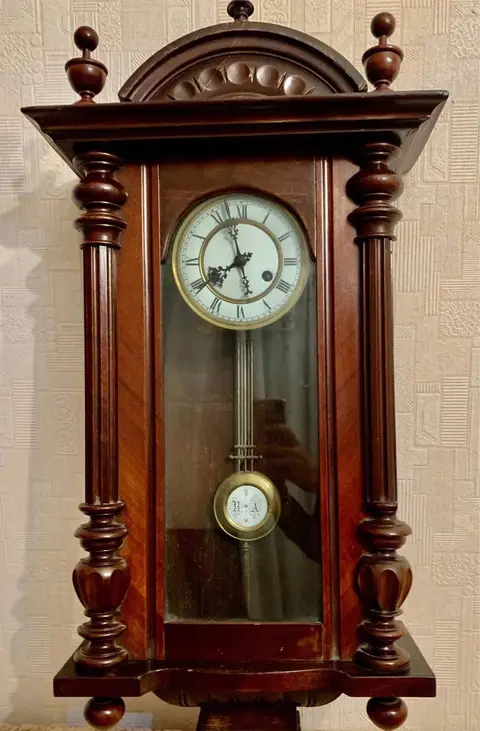 Ancient antique wall clock
