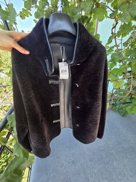 Black shearling-style jacket, size M