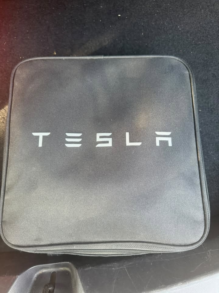 Tesla's original charger for 650 lari
