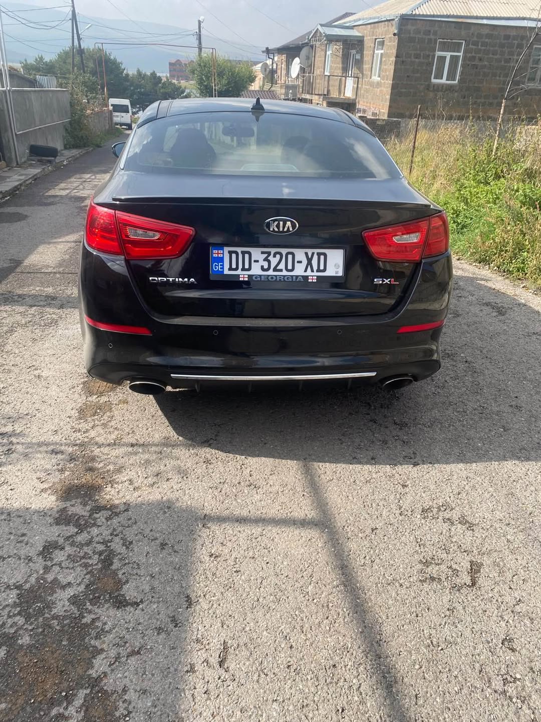 Kia Optima SXL, black sedan