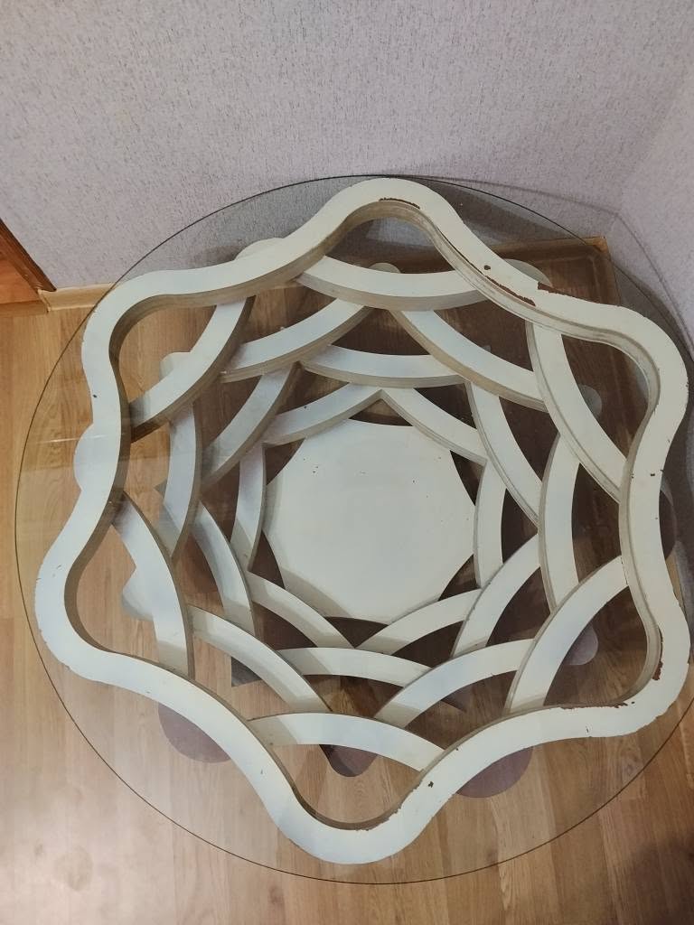 Glass table with white wooden base