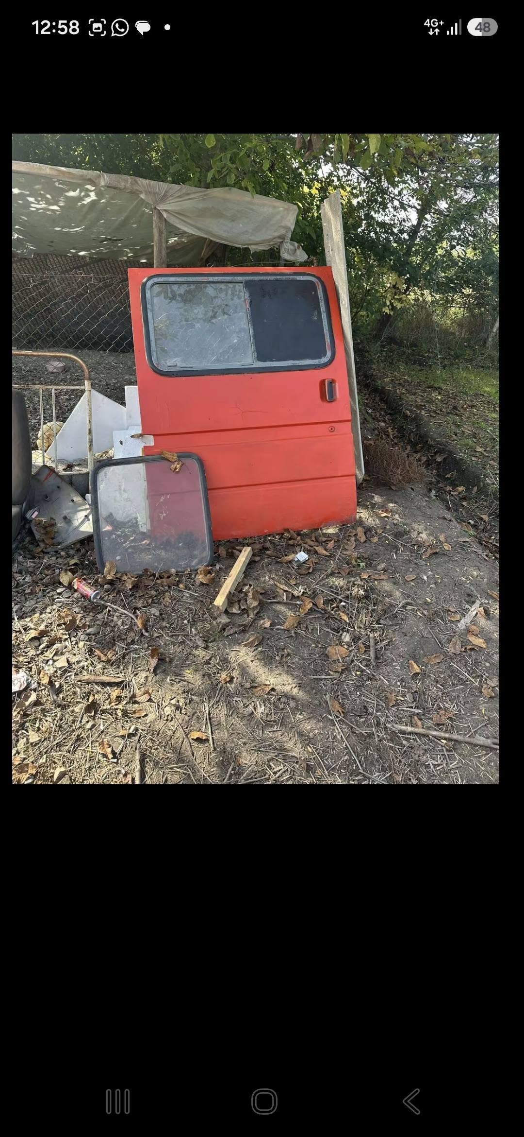 Red van door with side mirror