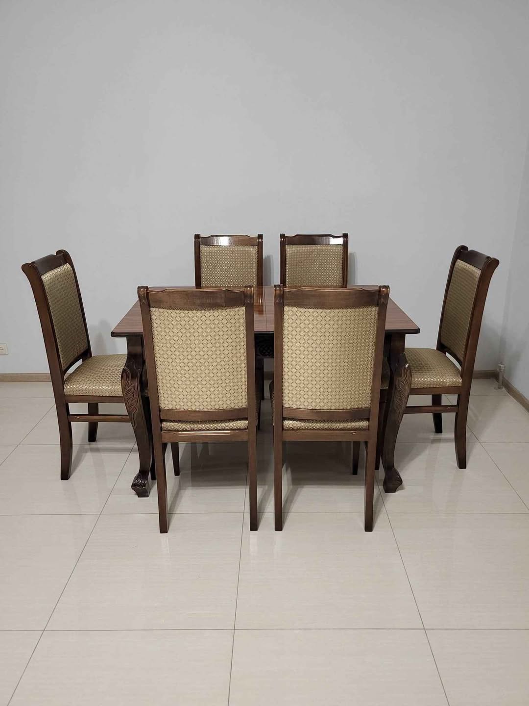 Carved dining table with 6 chairs