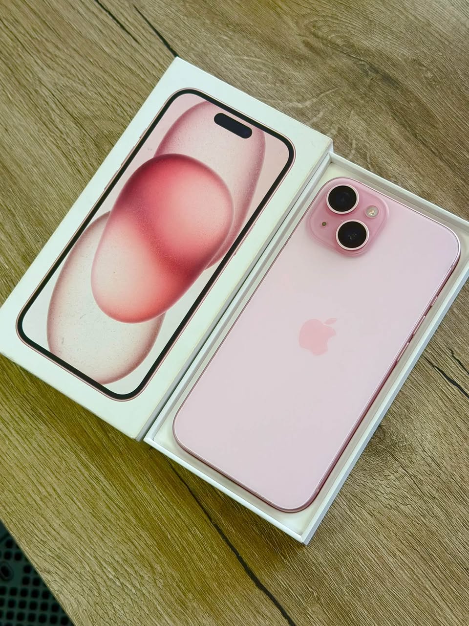 iPhone 15 Pink, 128 GB, brand new. Price is 1,050 Georgian Lari.