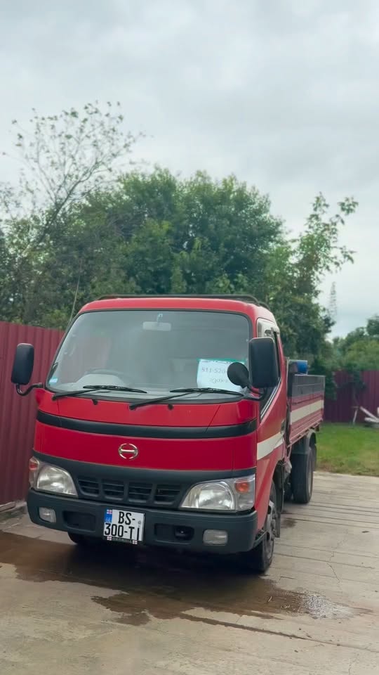 Red light dump truck, Georgian plates