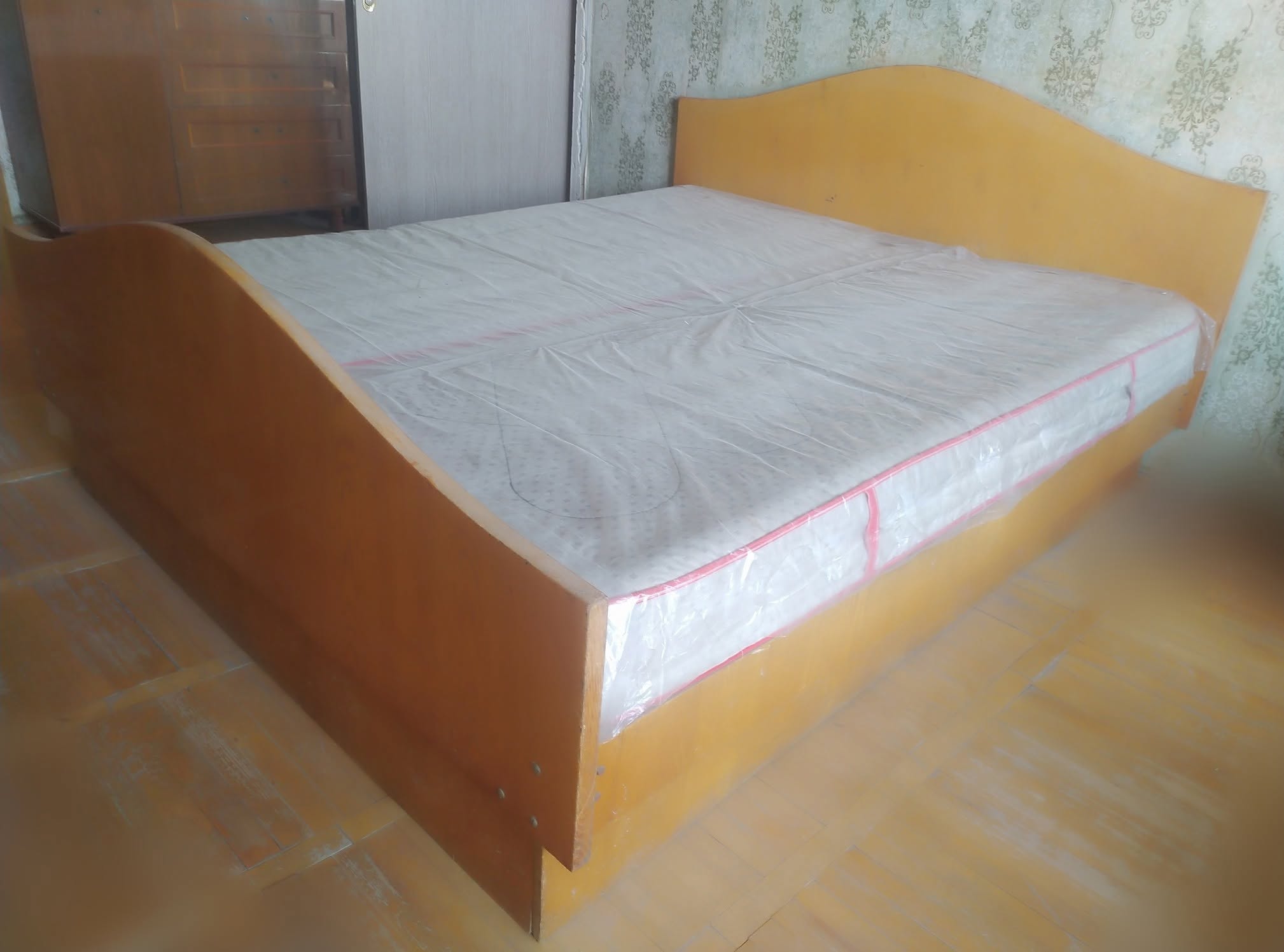 For sale a used double bed with a drawer headboard