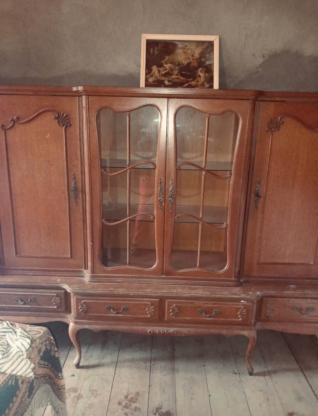 Walnut wood display cabinet with glass doors