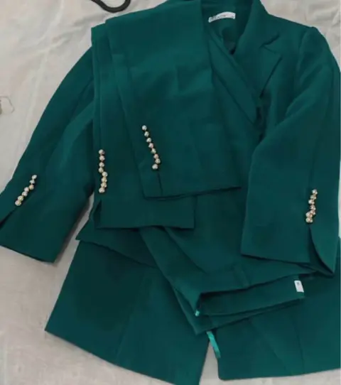 Green costume, size 36