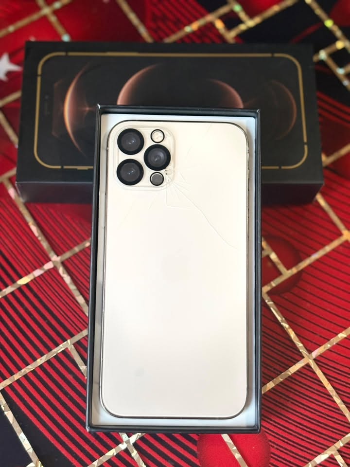 White iPhone with cracked back glass