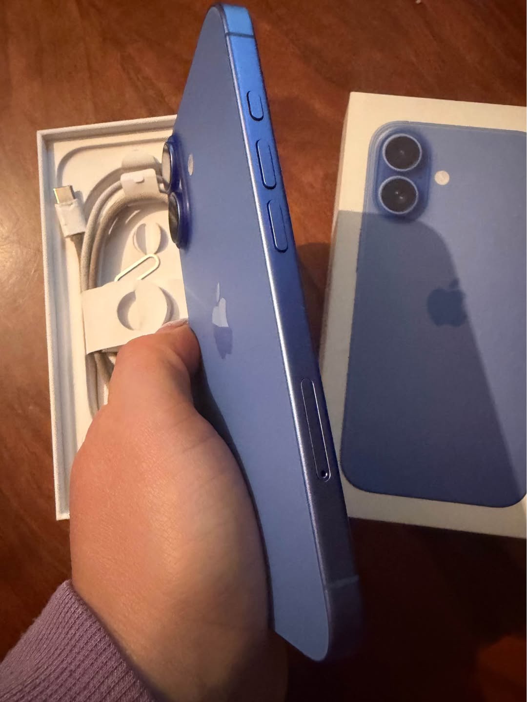 iPhone 16 in Sky Blue, well maintained