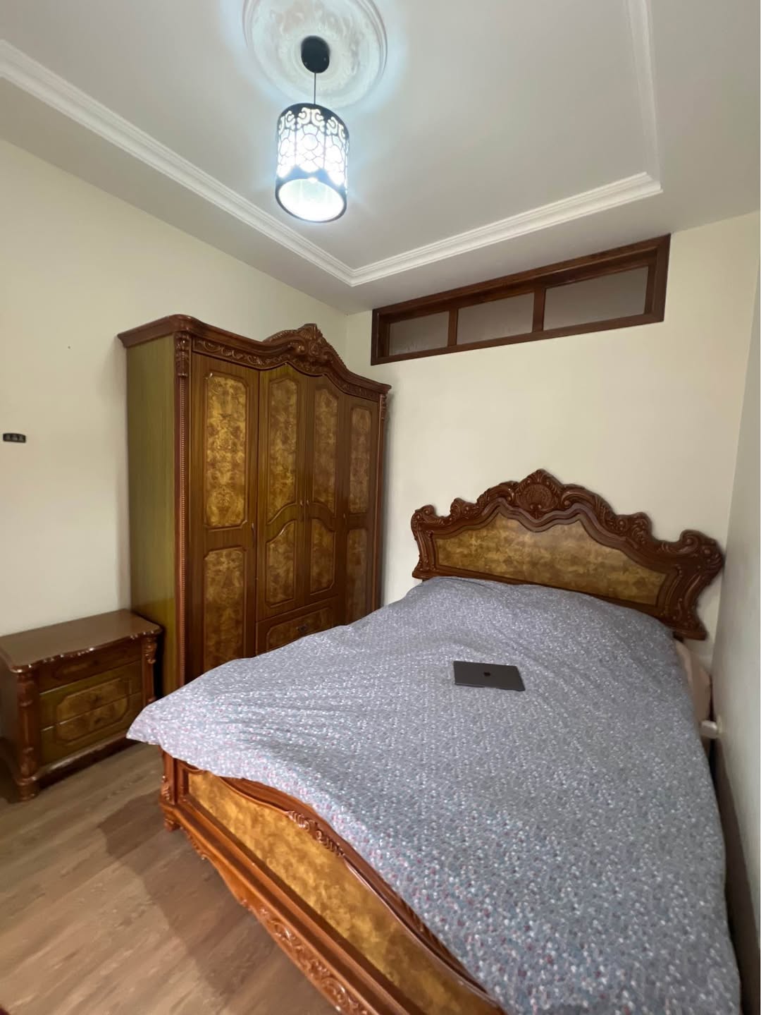 Classic bedroom set with bed and wardrobe