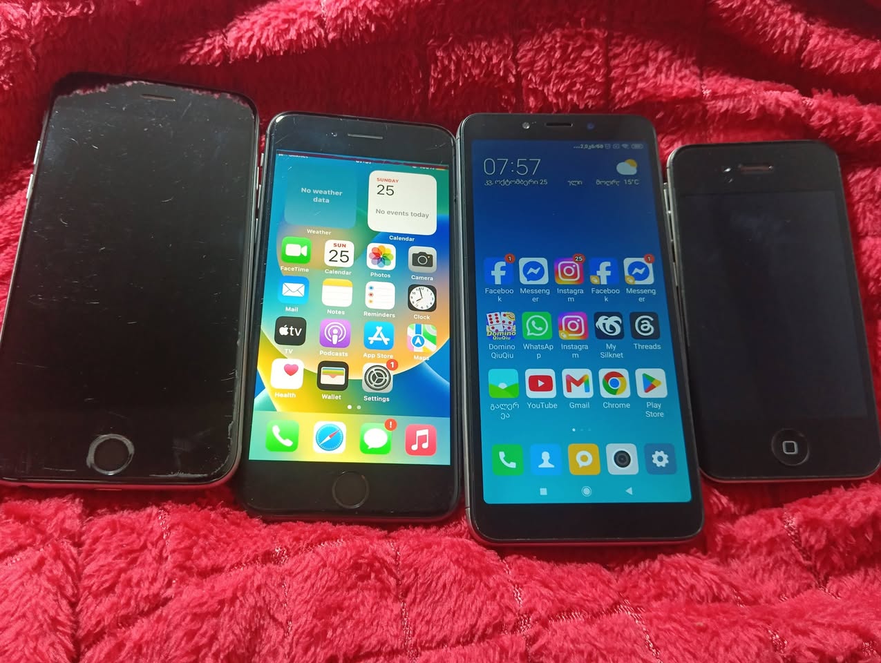 Four phones: iPhone 8, 6, 4 and Redmi