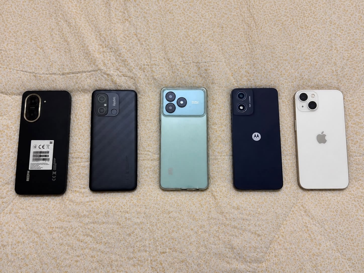 Five phones for sale, incl. iPhone 13