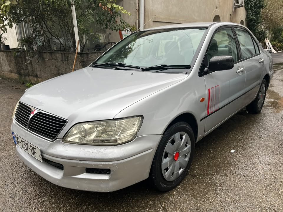 Mitsubishi Lancer 2000 — 1,200$