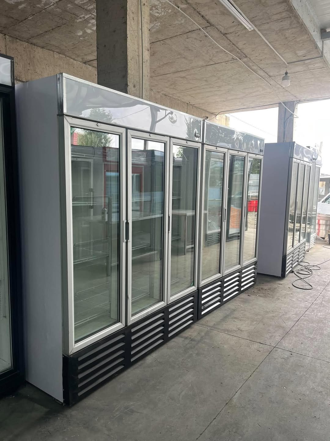 Beverage coolers of various sizes are for sale
