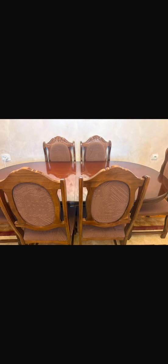 Wooden dining table with chairs