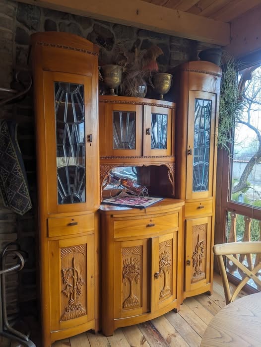 Antique carved wood display cabinet