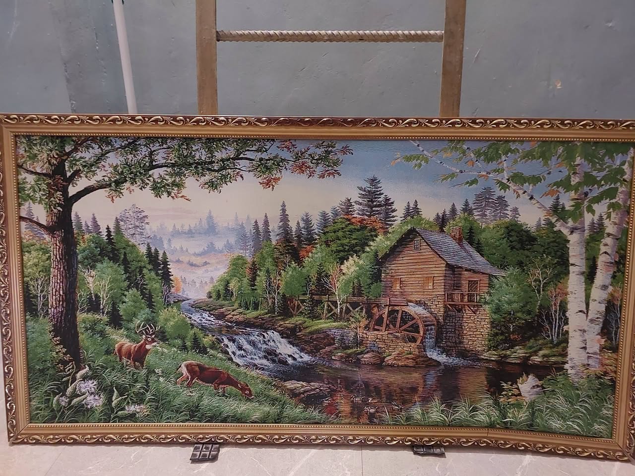Framed landscape picture with deer