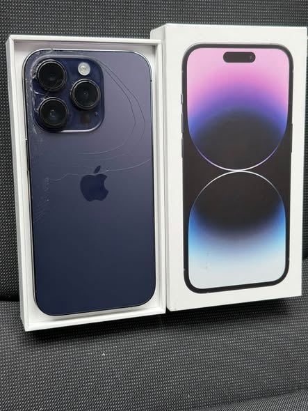 iPhone 14 Pro with box and charger
