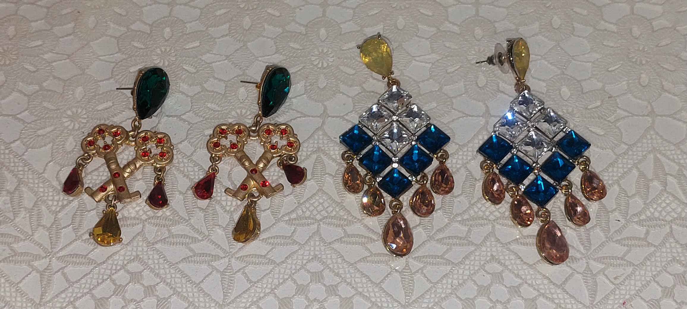 Two pairs of large party earrings