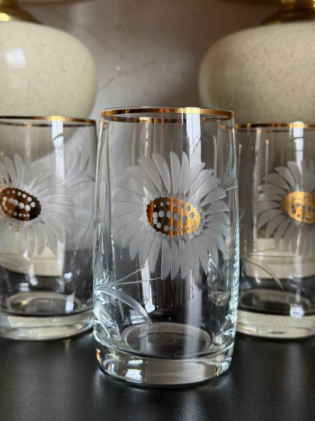 Etched glass tumblers with gold rim
