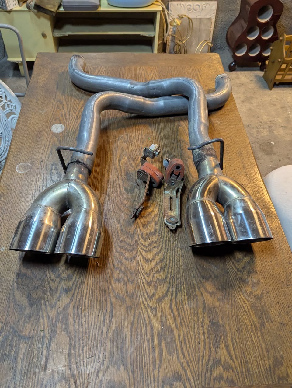 Exhaust system with twin stainless tips