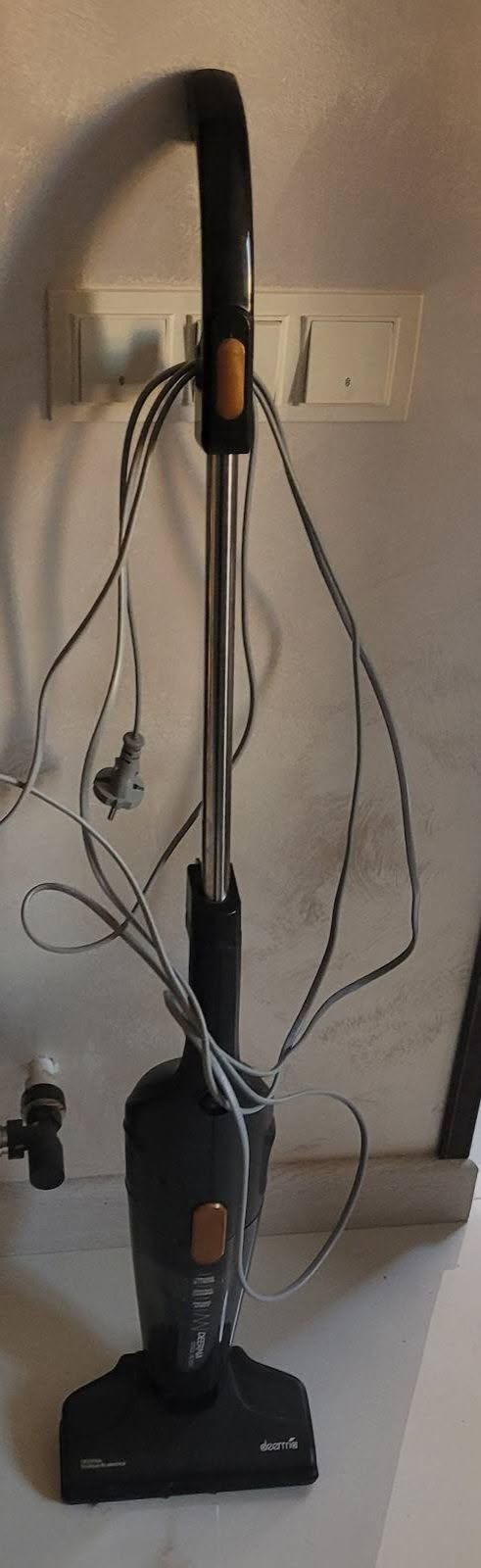 Stick vacuum cleaner, used, black