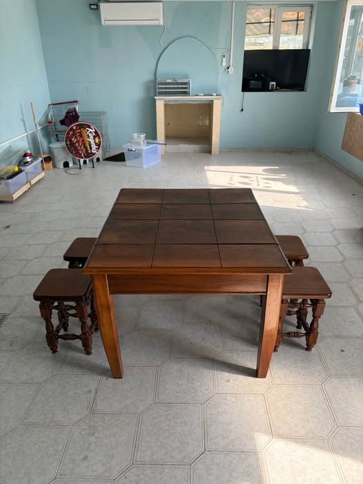 Wooden dining table with stools