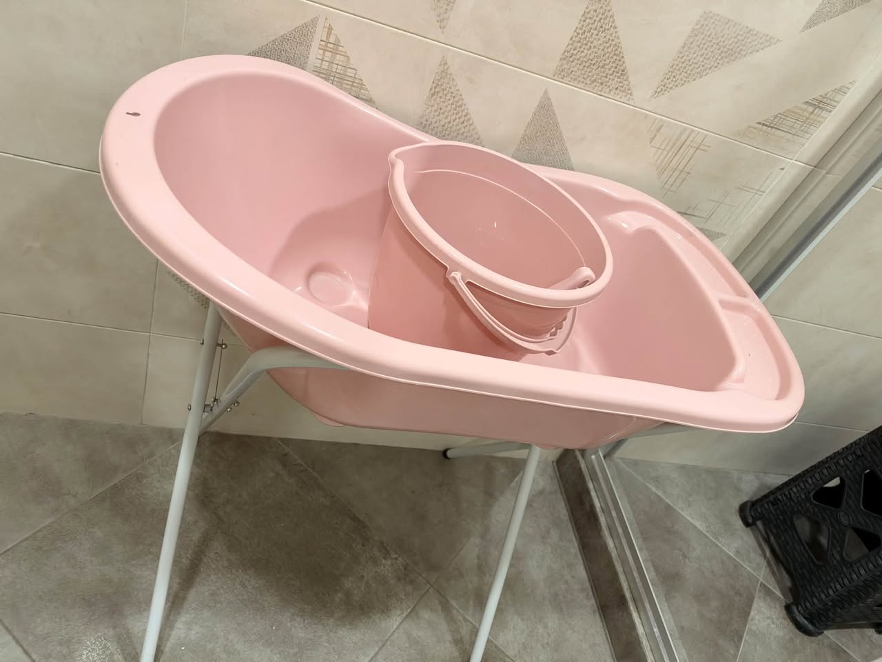 Pink baby bath with stand