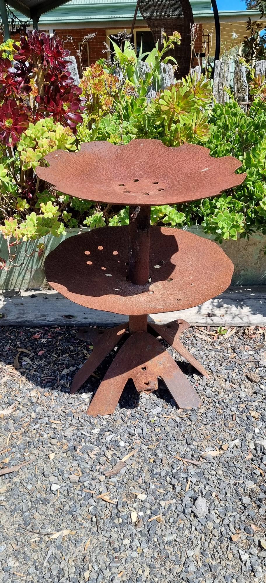 Rustic garden feature made of discs