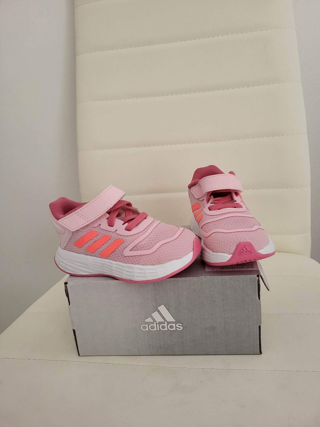 New pink Adidas kids' sneakers