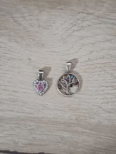Pendants: pink heart and tree of life