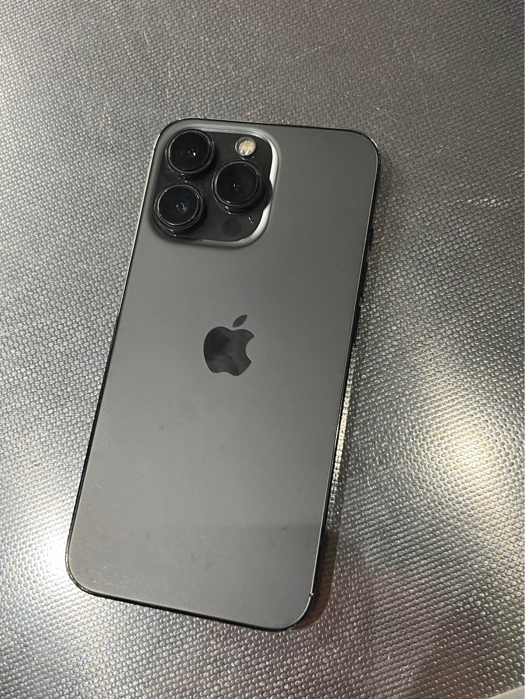 iPhone 13 Pro, 73% battery, cracked screen