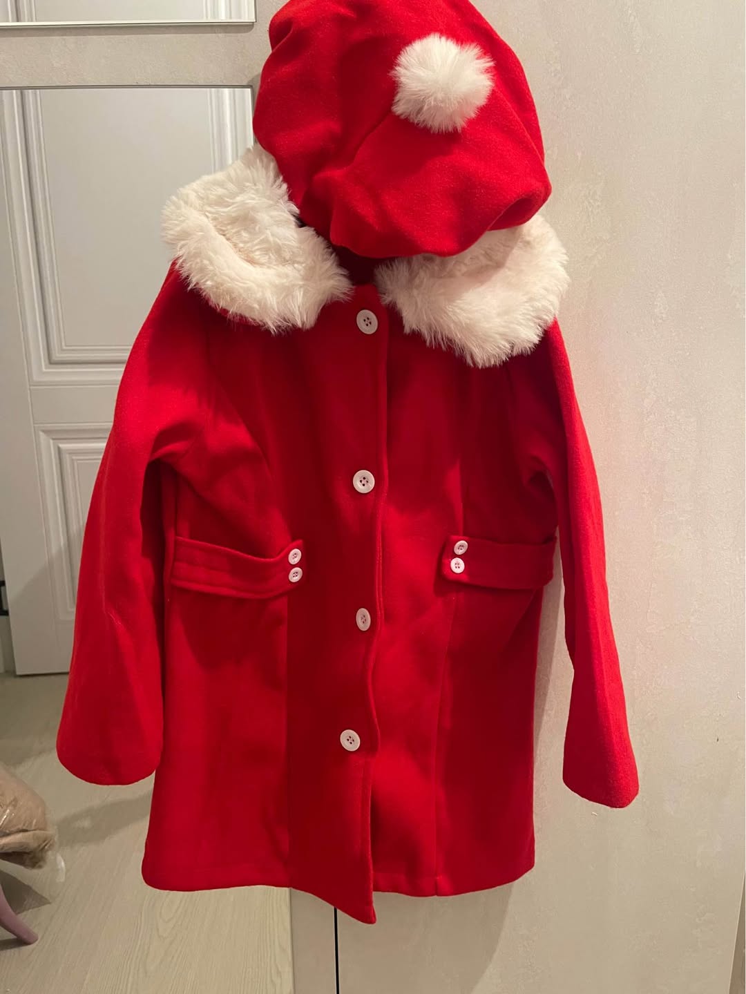 Red children's coat with hood