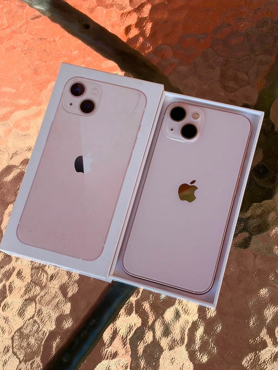 iPhone 13 Pink, 128 GB; battery health 76%. Costs 550₾
