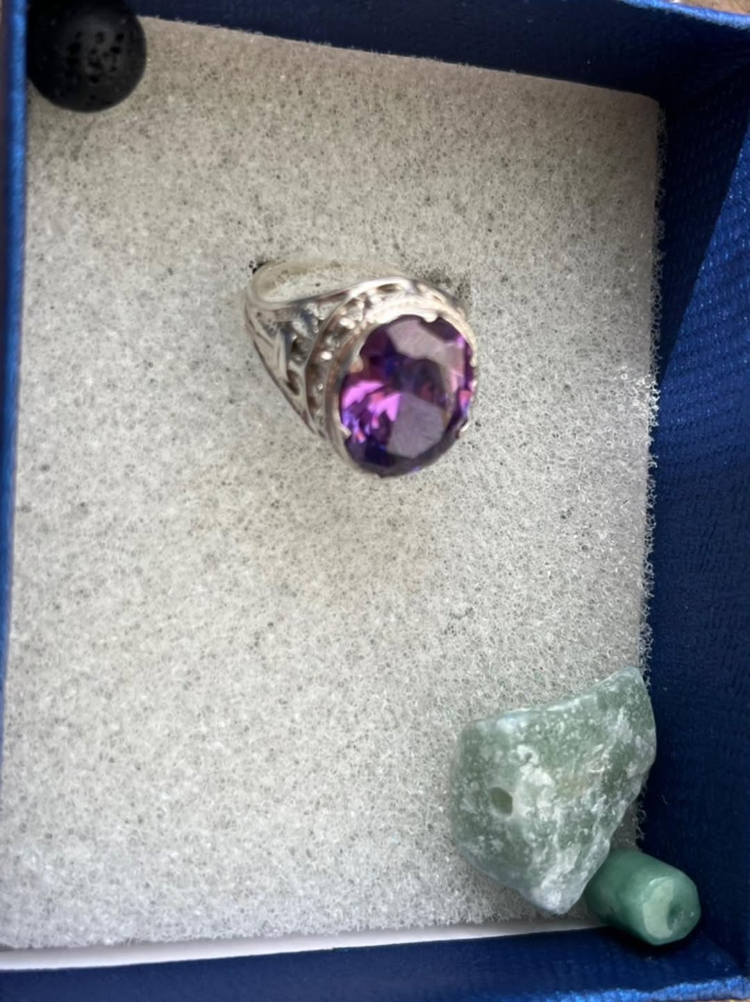 Silver ring with an amethyst eye
