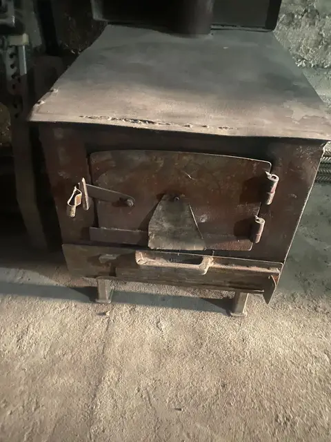 Cast-iron wood stove, urgent sale