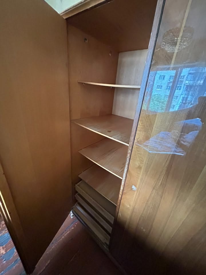 Wooden display cabinet with glass doors
